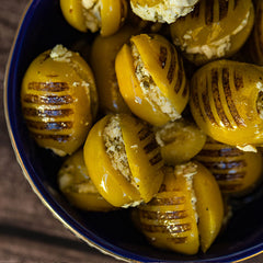 Grilled olives with Marinated Feta Cheese