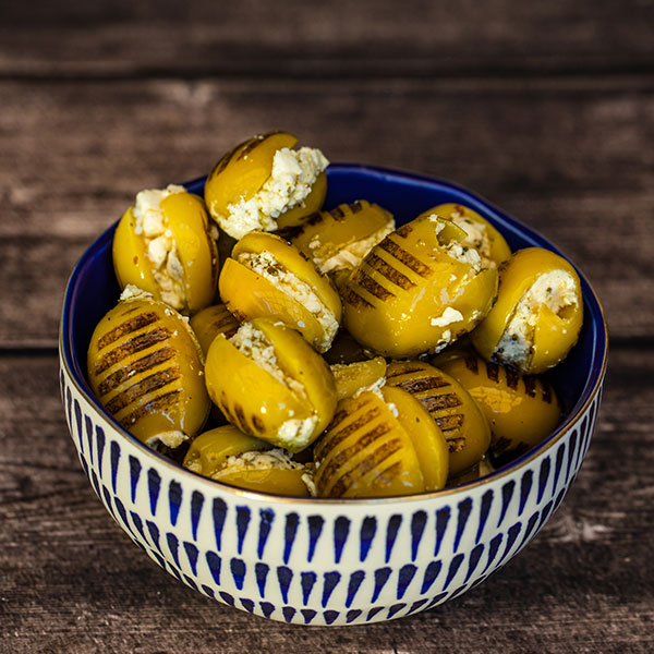 Grilled olives with Marinated Feta Cheese